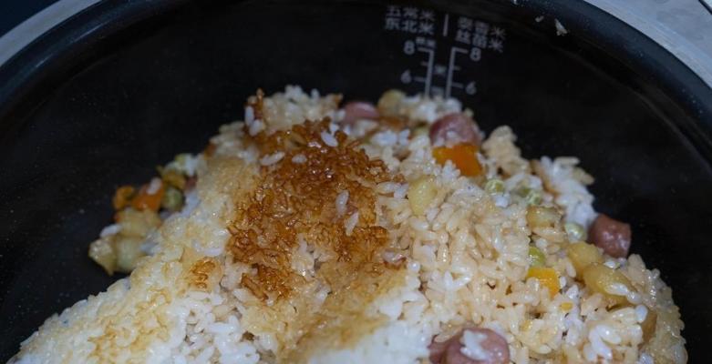 电饭煲蒸饭没熟如何处理（解决米饭未煮熟的问题）  第2张